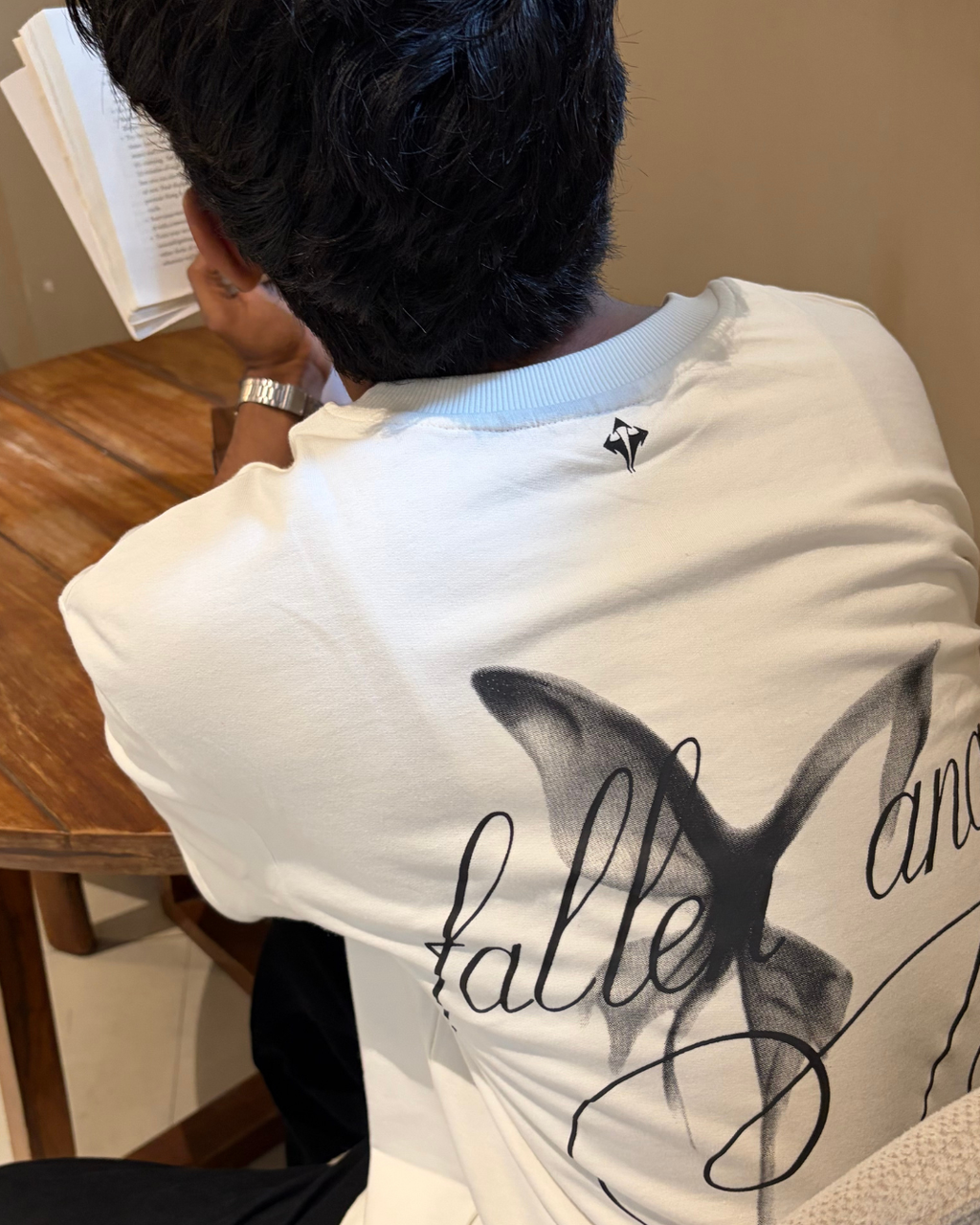 GRAHITE white oversized t-shirt with Halle Angel graphic print on back