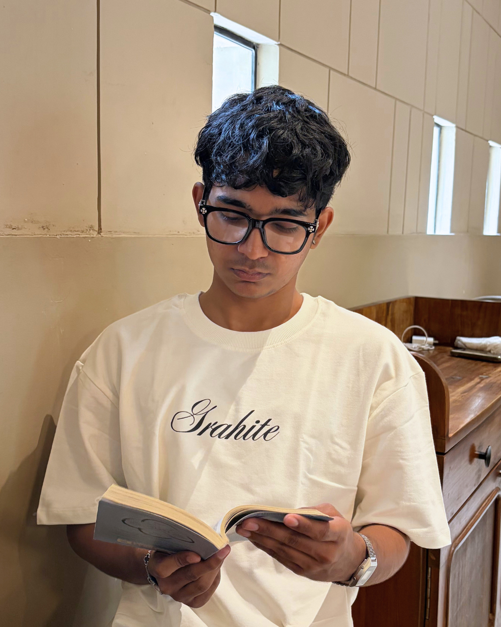 GRAHITE white oversized t-shirt with logo print, front view