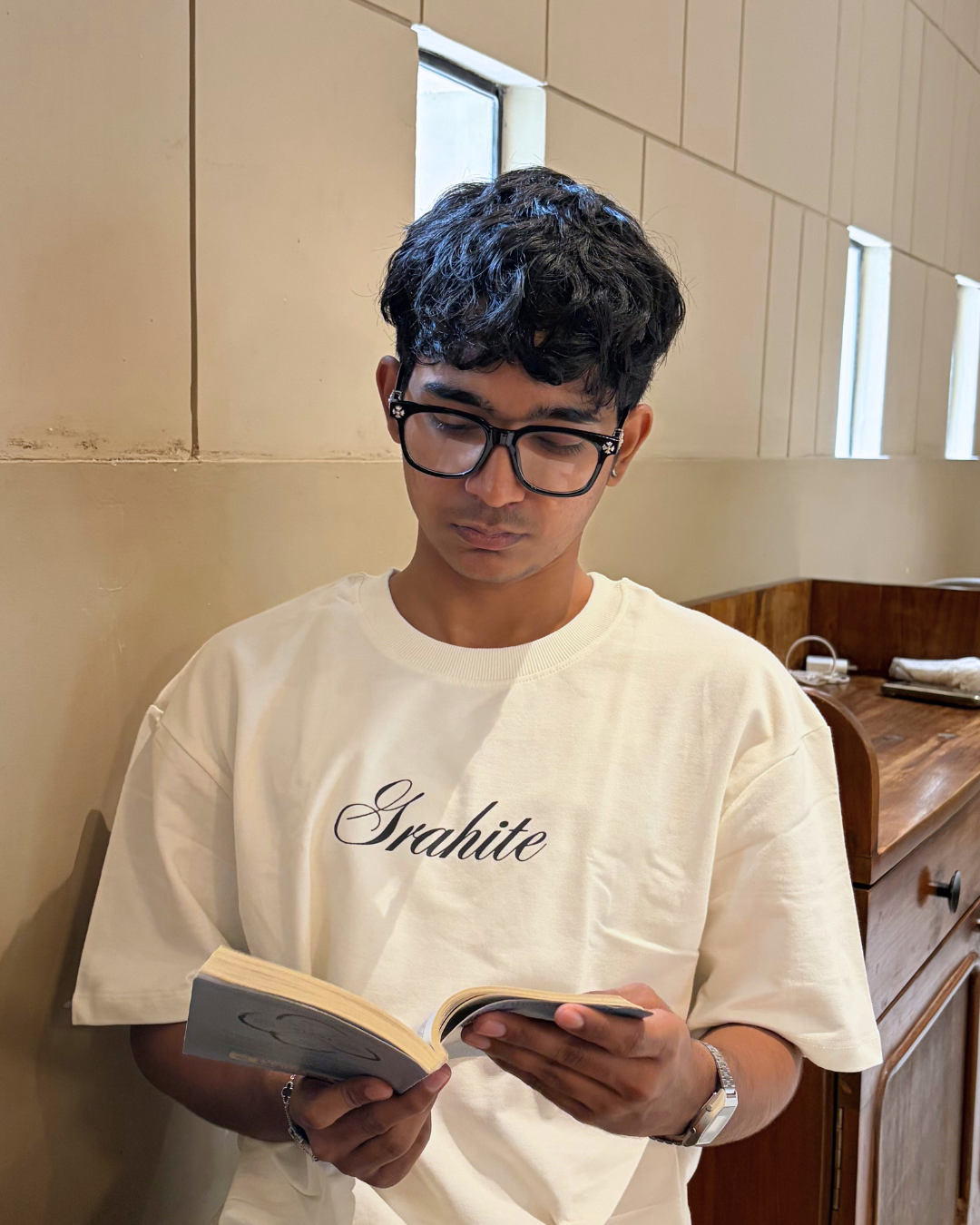 GRAHITE white oversized t-shirt with logo print, front view