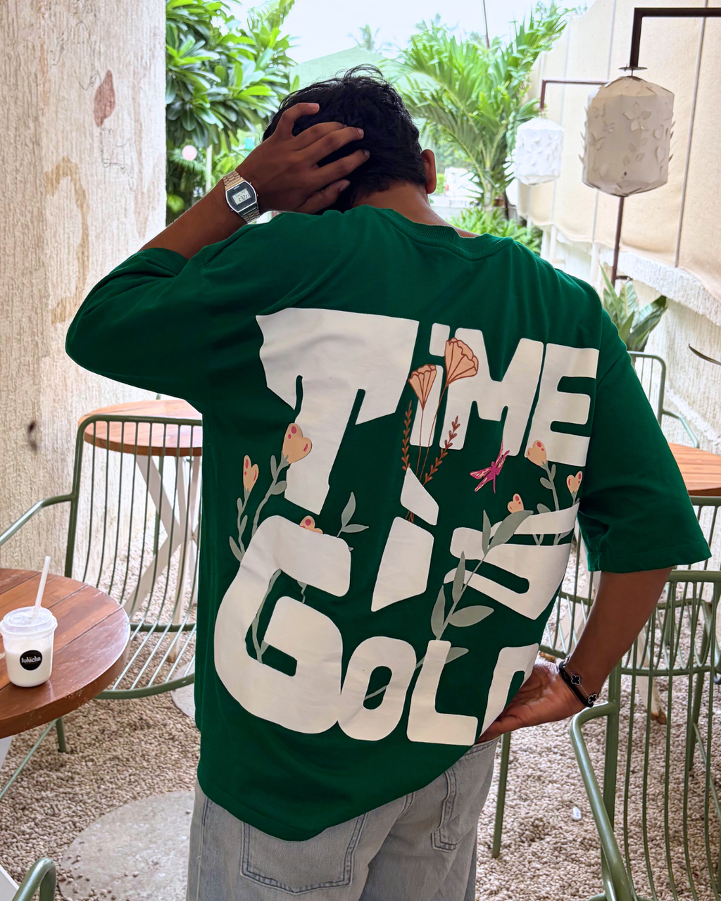 GRAHITE green oversized t-shirt with Time Is Gold graphic print on back