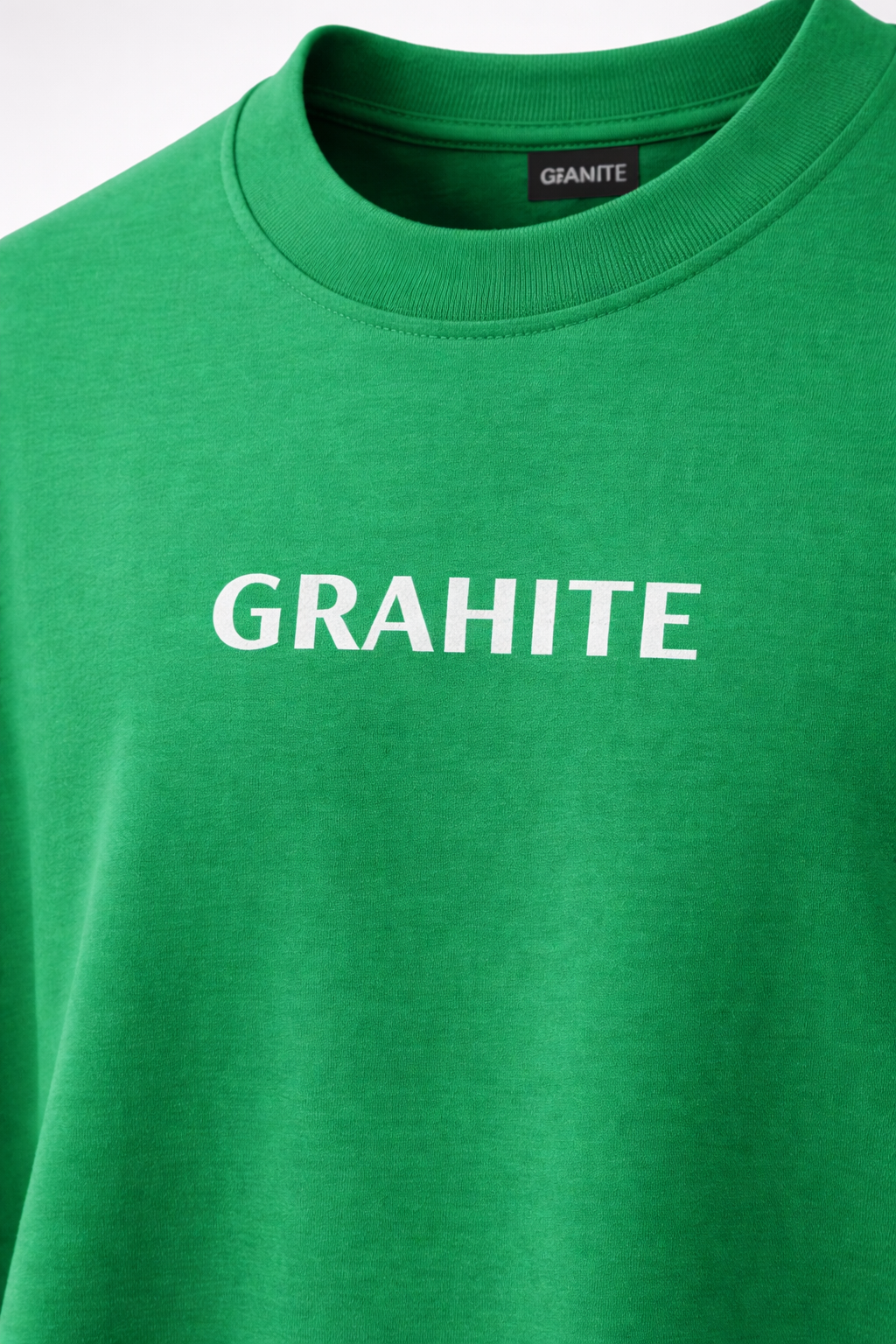 Green sweatshirt with 'GRAHITE' text on a white background